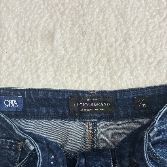 Lucky Brand Lace-Up Denim Jeans Dark Wash with Curved Seams & Flared Scallop Hem - Picture 6 of 7